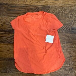Beyond Yoga Women's Short Sleeve Tee in Bright Orange